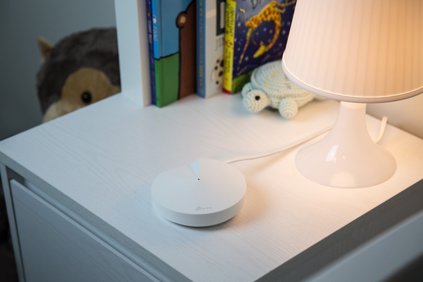 TP-Link Deco M5 on a nightstand