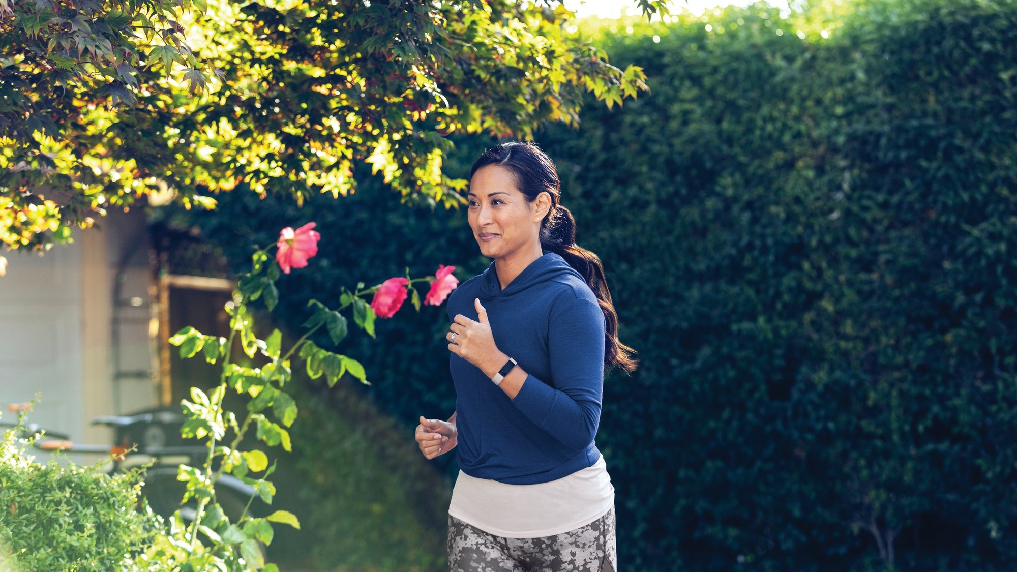 Fitbit Inspire 2 Lifestyle Sidewalk Mom Running Lunar White