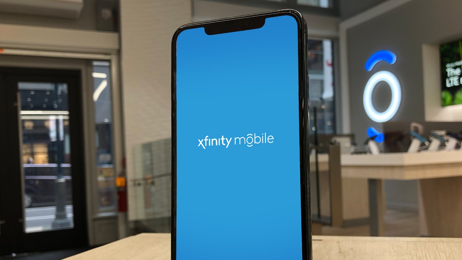 Xfinity Mobile Logo On Phone