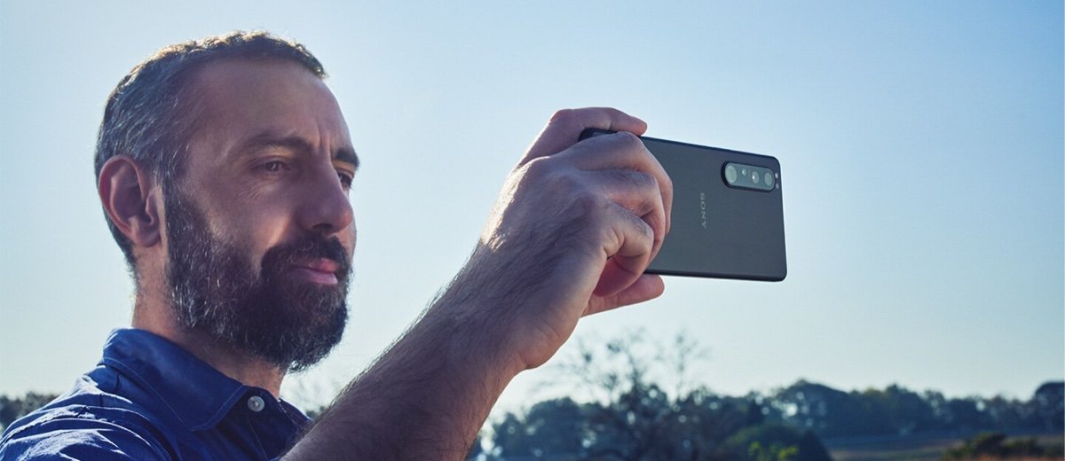 A man holds a Sony Xperia 1 III for a photo