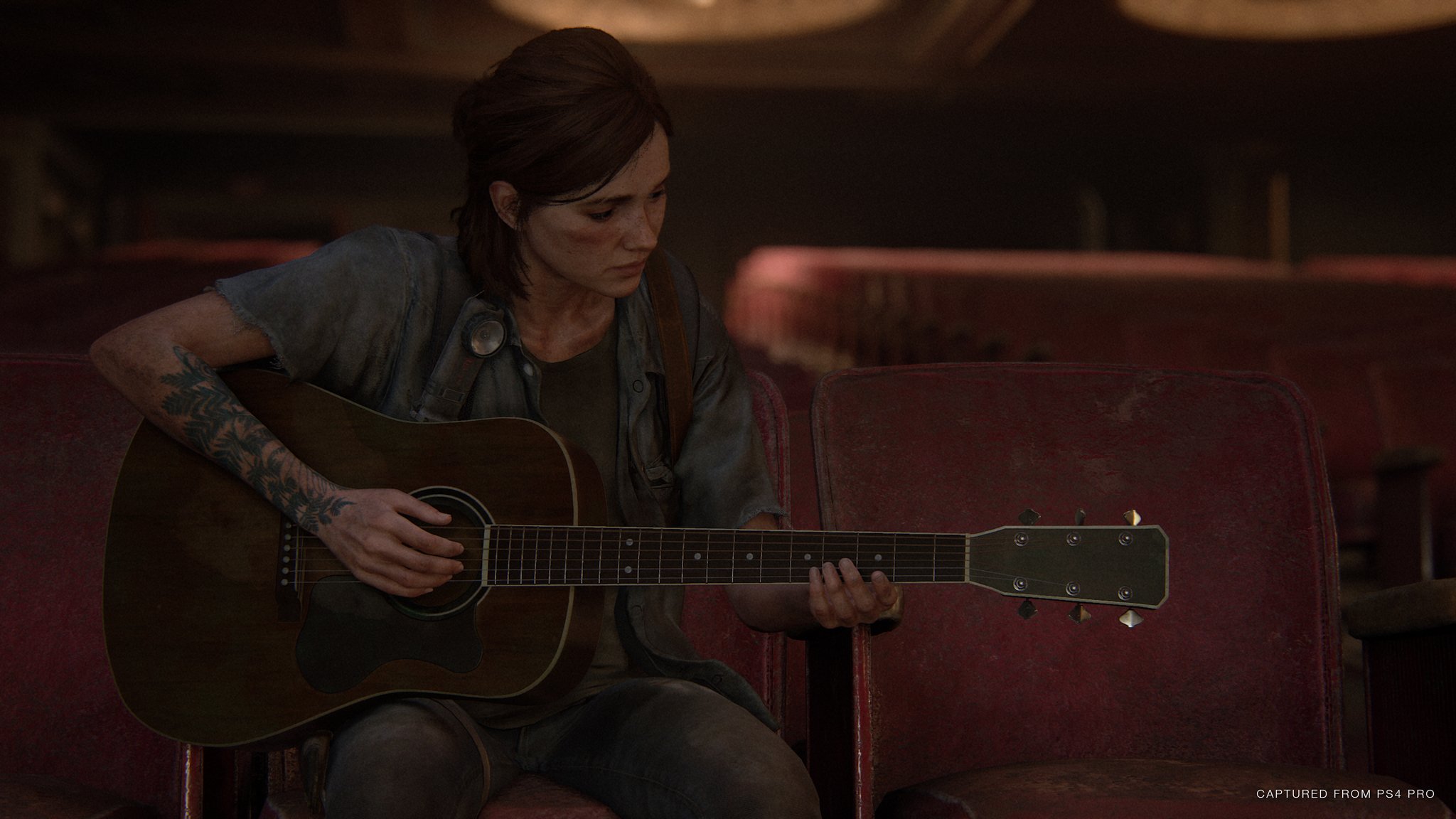 Ellie playing guitar