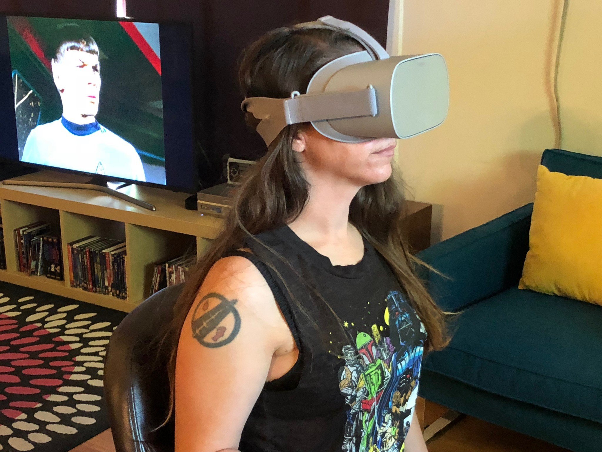 Woman sitting while using Oculus Go