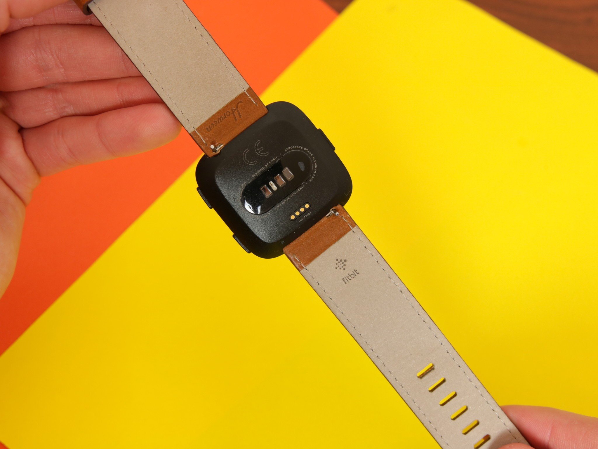 changing watch band on fitbit versa