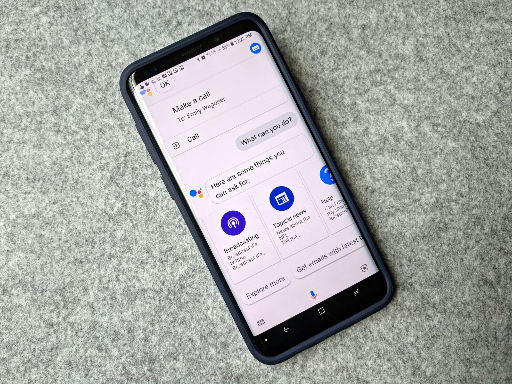 A phone showing a Google Assistant menu, with options for some commands you can make