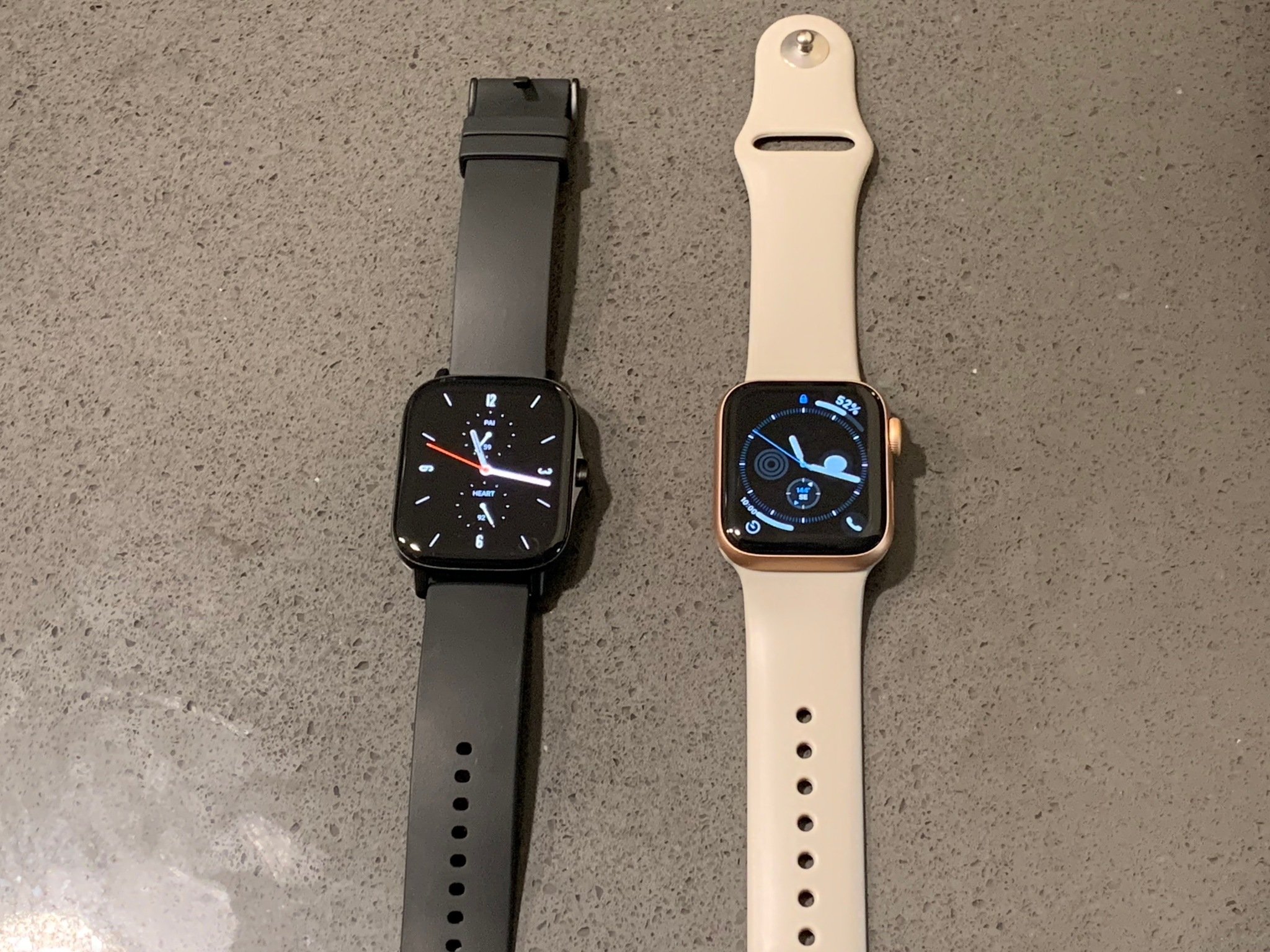 The AmazFit GTS 2 next to an Apple Watch