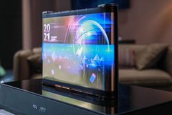 TCL shows off rollable display tech with a cool scroll-like tablet concept