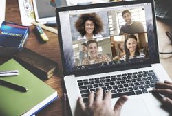 Keep in contact with co-workers with video conference software